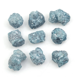 blue natural rough diamond pieces displayed for engagement ring and jewelry projects