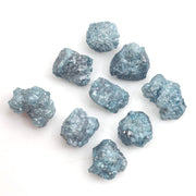 blue natural rough diamond pieces displayed for engagement ring and jewelry projects