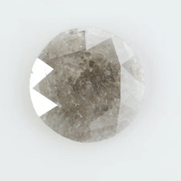 Round-cut salt and pepper lab-grown diamond with unique natural inclusions, ethically created for custom engagement rings and fine jewelry