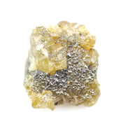 Uncut yellow diamond in natural rough form, weighing 0.92 carats, suitable for a gold promise ring design