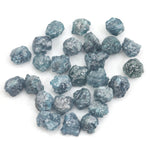 natural blue rough diamond with a raw uncut diamond for engagement jewelry