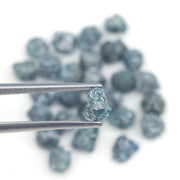 natural blue rough diamond with a raw uncut diamond for engagement jewelry