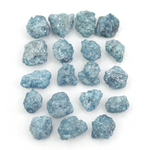 blue natural raw diamond pieces arranged as a loose uncut rough diamond lot