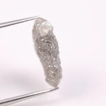 rough diamond in rock, round rough diamond, what do rough diamonds look like, natural grey diamond, diamond naturals, lab grown diamonds vs natural, black faceted diamond