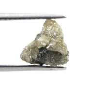 loose yellow raw diamond with a natural rough texture, suitable for creating a custom gold pendant.