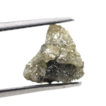 loose yellow raw diamond with a natural rough texture, suitable for creating a custom gold pendant.