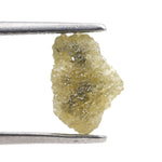 rough yellow diamond with an uncut natural appearance for a bespoke gold brooch jewelry design.