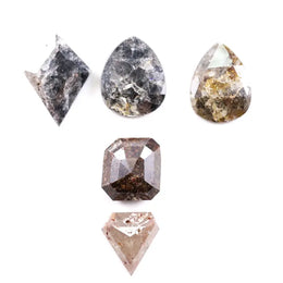 Mixed shape natural rustic diamonds lot featuring rose cut grey brown stones in pear, kite and asscher shapes for custom jewelry