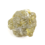 natural yellow uncut diamond with a rugged surface, suitable for designing a distinctive custom ring.