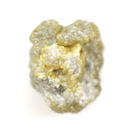 natural yellow uncut diamond with a rugged surface, suitable for designing a distinctive custom ring.