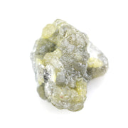 unpolished yellow natural diamond with a rough exterior, selected for creating distinctive gold fine jewelry pieces.