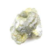 unpolished yellow natural diamond with a rough exterior, selected for creating distinctive gold fine jewelry pieces.