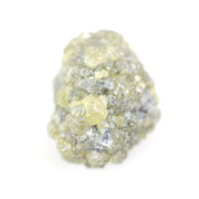 natural yellow diamond in an uncut, irregular form for creating bespoke gold jewelry with a distinctive raw appearance.