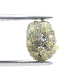 natural yellow diamond in an uncut, irregular form for creating bespoke gold jewelry with a distinctive raw appearance.