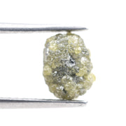 natural yellow diamond in an uncut, irregular form for creating bespoke gold jewelry with a distinctive raw appearance.