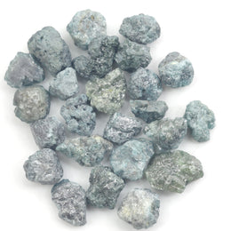 fancy blue rough diamond with a raw uncut diamond for jewelry making