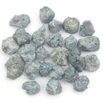 fancy blue rough diamond with a raw uncut diamond for jewelry making