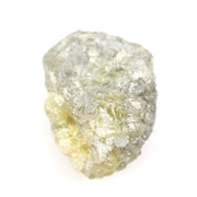 uncut yellow natural diamond with a rugged, irregular surface for designing personalized gold jewelry pieces.