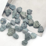 fancy blue rough diamond with a raw uncut diamond for jewelry making
