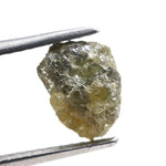 uncut yellow natural diamond with a rugged, irregular surface for designing personalized gold jewelry pieces.