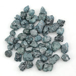 natural blue rough diamond with raw uncut texture for custom jewelry designs