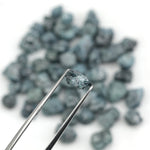 natural blue rough diamond with raw uncut texture for custom jewelry designs
