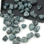 natural blue rough diamond with raw uncut texture for custom jewelry designs