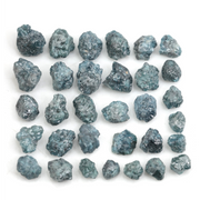 natural blue rough diamond pieces in an uncut loose diamond lot
