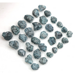 natural blue rough diamond pieces in an uncut loose diamond lot