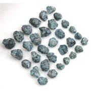 natural blue rough diamond pieces in an uncut loose diamond lot