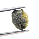 uncut yellow diamond in its natural rough form, suitable for crafting a distinctive custom ring with a unique raw appearance.
