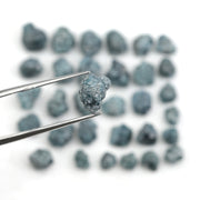 natural blue rough diamond pieces in an uncut loose diamond lot