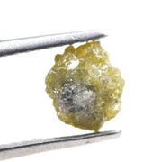 raw yellow natural diamond with an uncut surface, suitable for designing personalized promise rings and meaningful jewelry pieces.
