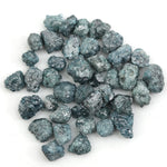 natural blue rough diamond with a raw uncut diamond for jewelry design