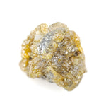 uncut yellow natural diamond with a raw, irregular surface for creating a distinctive anniversary ring or personalized jewelry design.