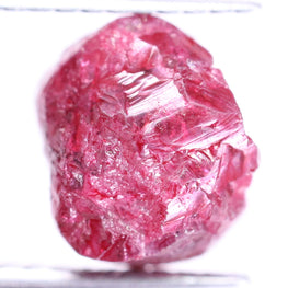 Pink diamond on a white background