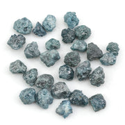 natural blue rough diamond with a raw uncut surface for jewelry design