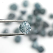 natural blue rough diamond with a raw uncut surface for jewelry design