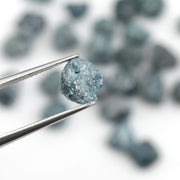 natural blue rough diamond with a raw uncut surface for jewelry design