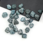 natural blue rough diamond with a raw uncut surface for jewelry design