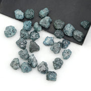natural blue rough diamond with a raw uncut surface for jewelry design