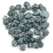 blue natural rough diamond with an irregular raw surface for jewelry making