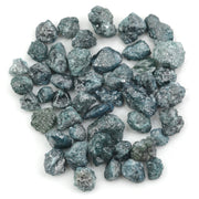 blue natural rough diamond with an irregular raw surface for jewelry making