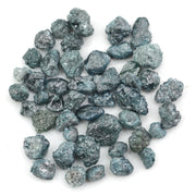 blue natural rough diamond with an irregular raw surface for jewelry making