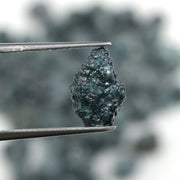blue natural rough diamond with an irregular raw surface for jewelry making