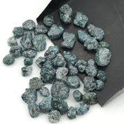 blue natural rough diamond with an irregular raw surface for jewelry making