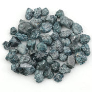natural blue rough diamond with a raw uncut surface for jewelry designers
