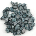 natural blue rough diamond with a raw uncut surface for jewelry designers