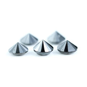 Five natural round cut black diamonds with faceted surfaces showing natural inclusions and dark carbon tones, loose untreated genuine diamonds suitable for custom jewelry making.