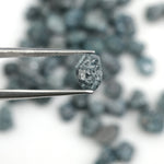 natural blue rough diamond with a raw uncut surface for jewelry designers